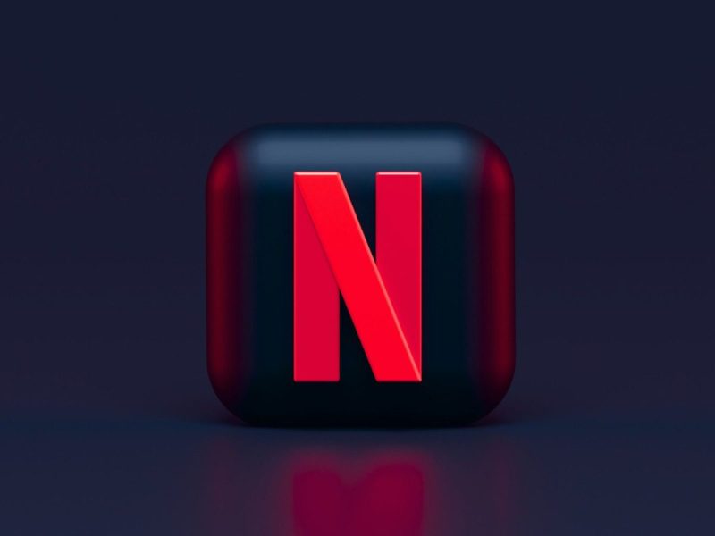 Netflix logo against black background.