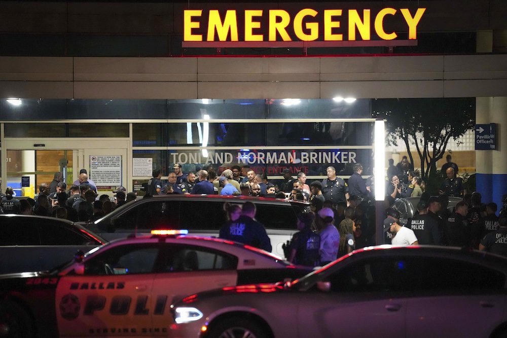 Dallas officer killed and 2 wounded by man who targeted police, chief says