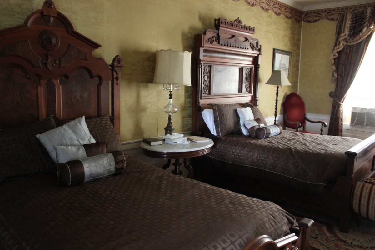 Side by side beds viewable on a Texas ghost tour.