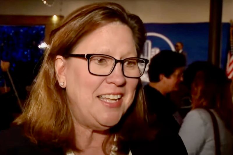 Julie Johnson speaking to reporter