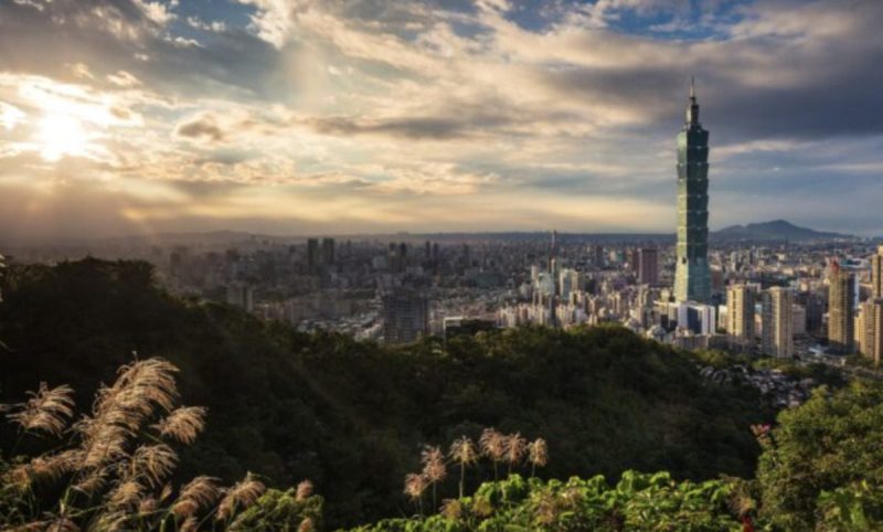 sun setting over taipei, taiwan