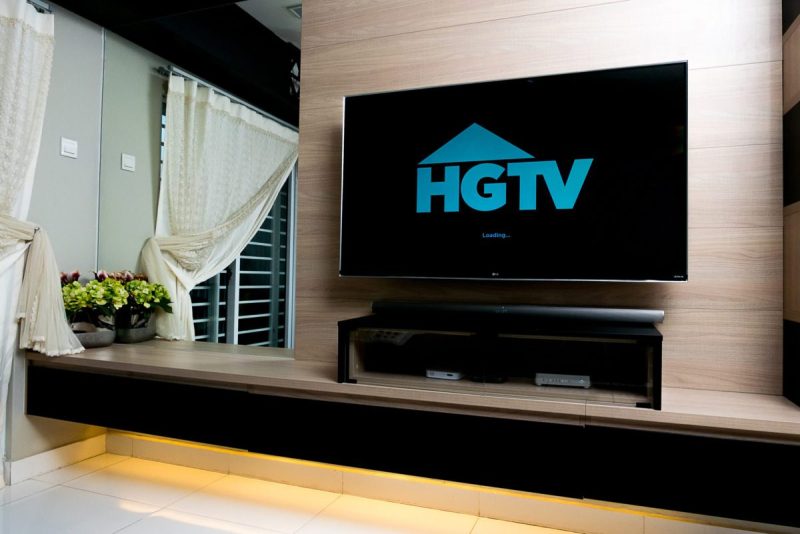 a television screen displays the HGTV logo