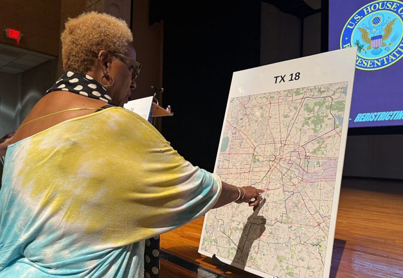 Voter reviews redistricting map in Houston