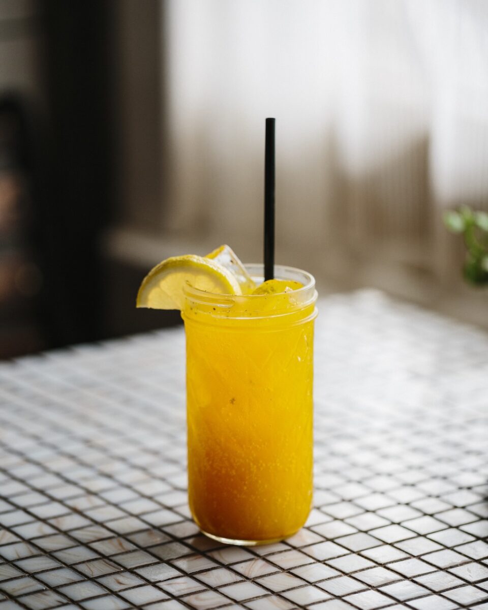 photo of a yellow and orange mocktail