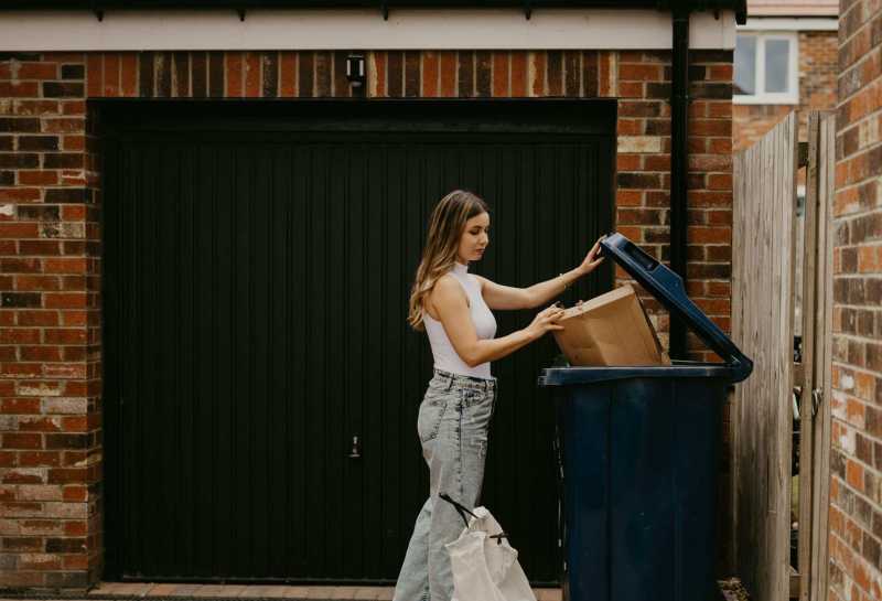A proposed $5 monthly trash pickup fee is part of City Hall’s annual budget proposal.