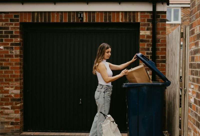 A proposed $5 monthly trash pickup fee is part of City Hall’s annual budget proposal.