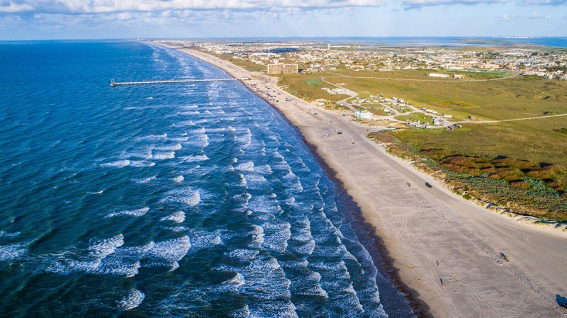 Sunrise on Padre Island from High Drone View with waves crashing along Beach such a paradise perfect summer escape.