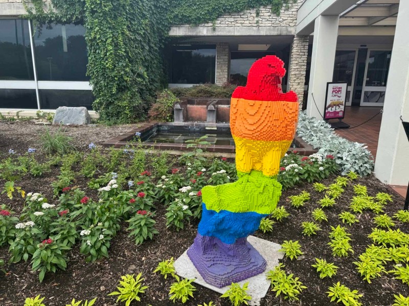 A colorful rainbow eagle greets summer visitors at the entrance to the Fort Worth Botanic Garden.