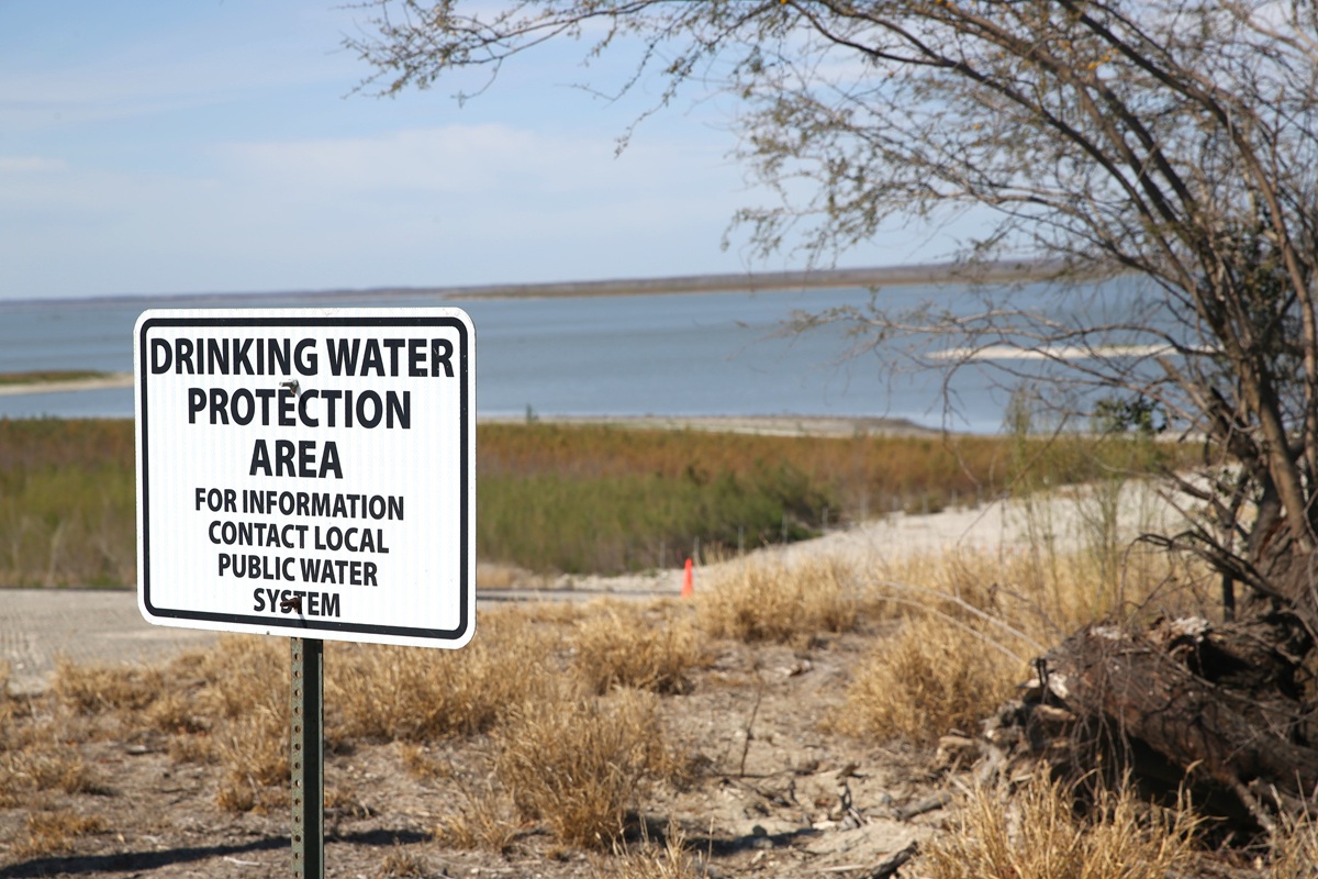 A drinking water protection sign is shown near Choke Canyon Reservoir South Shore dam