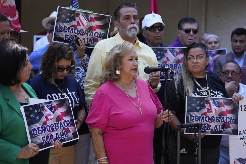 Latino voting rights group calls for investigation after Texas authorities search homes