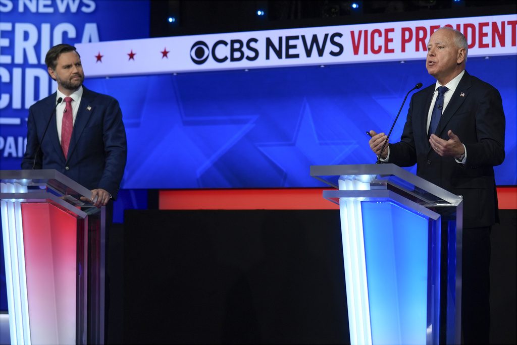 Democratic vice presidential nominee Minnesota Gov. Tim Walz speaks during a vice presidential debate hosted by CBS News, with Republican vice presidential nominee Sen. JD Vance, R-Ohio, Tuesday, Oct. 1, 2024, in New York. (AP Photo/Matt Rourke)