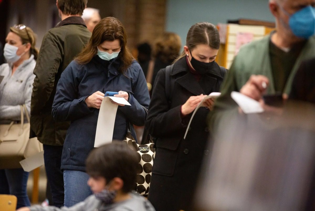 People waiting in line to vote